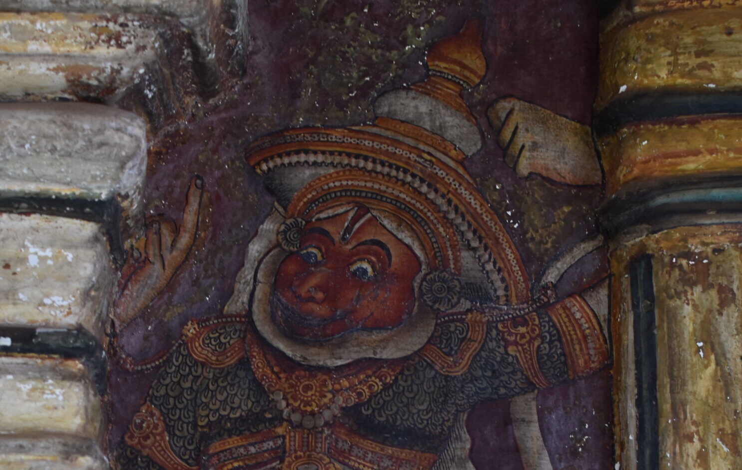 Veerabhadra mural figure showing theatrical posture and costume